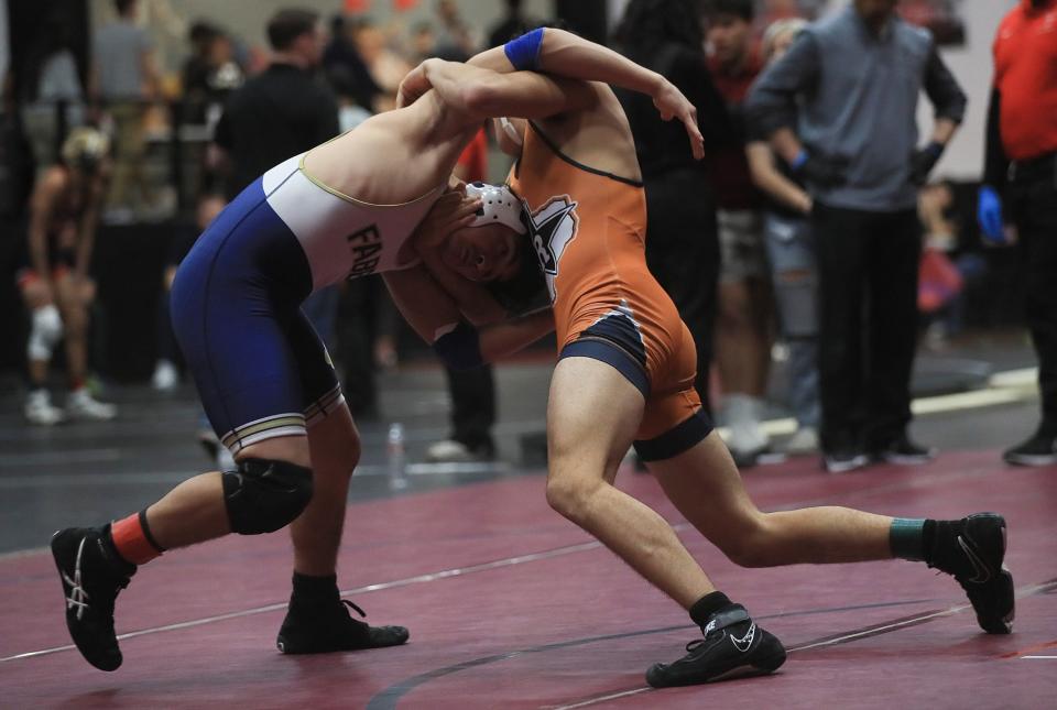 Kevin Perez, a Riverside wrestler, comes out victorious after facing off against Cesar Aguirre of Fabens at J.M. Hanks High School on Saturday, Feb. 4.