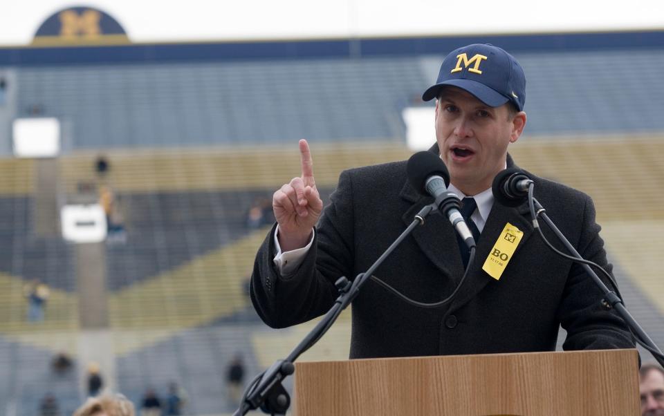 Glenn "Shemy" Schembechler III, son of former Michigan football coach Bo Schembechler, speaks at a public memorial service for his father, Nov. 21, 2006, at Michigan Stadium in Ann Arbor.