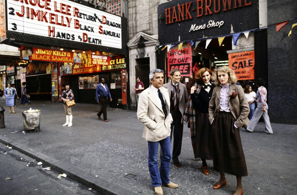 Designer Ralph Lauren and models walk on 42nd street in Times Square