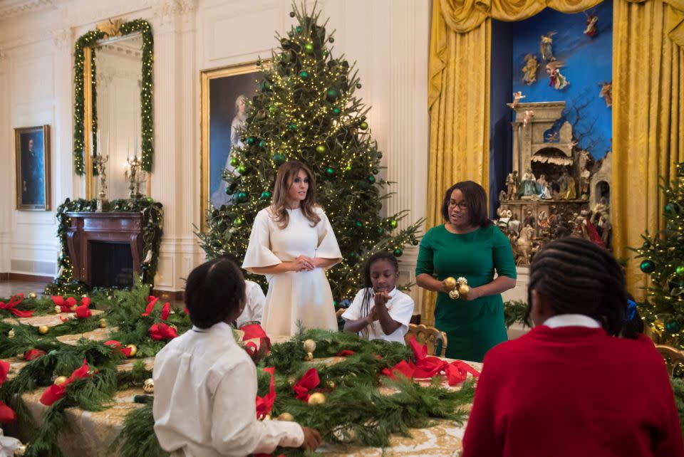 The FLOTUS welcomed children in to the White House to do holiday craft. Photo: Getty