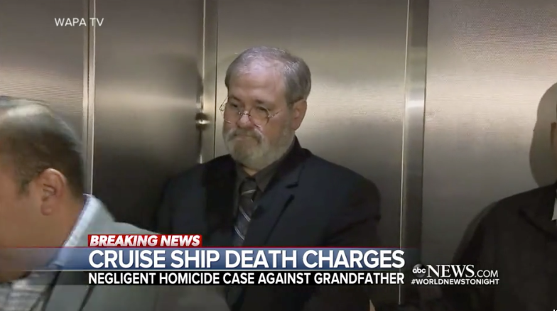 A TV news still of Salvatore Anello in handcuffs in an elevator. 