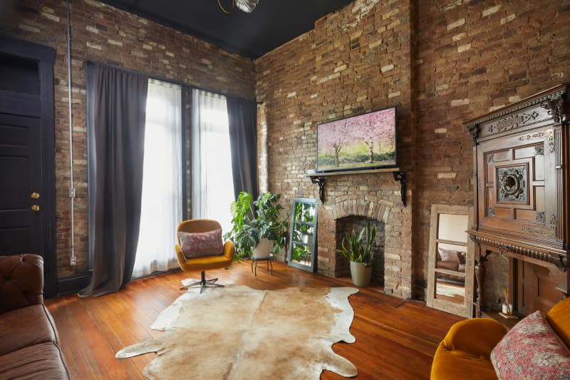 Brick walls in living room after renovation.