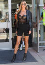 <p>Heidi Klum goes daring in a leather corset ensemble in L.A. on Aug. 10.</p>