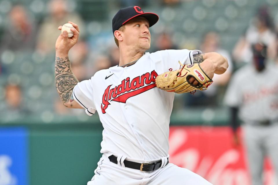 Cleveland pitcher Zach Plesac throws a pitch during the first inning on Friday, April 9, 2021, in Cleveland.