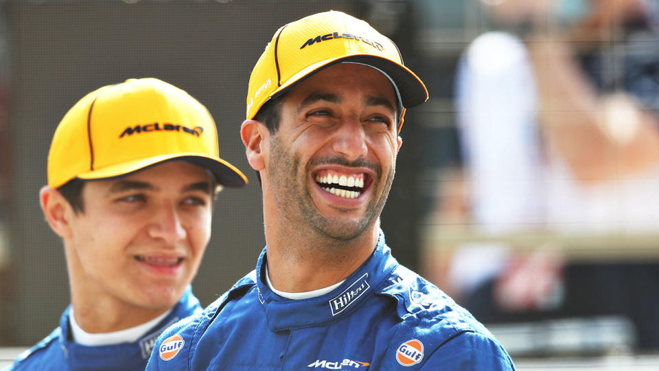 Daniel Ricciardo (pictured) laughs during a pre-season photo shoot.