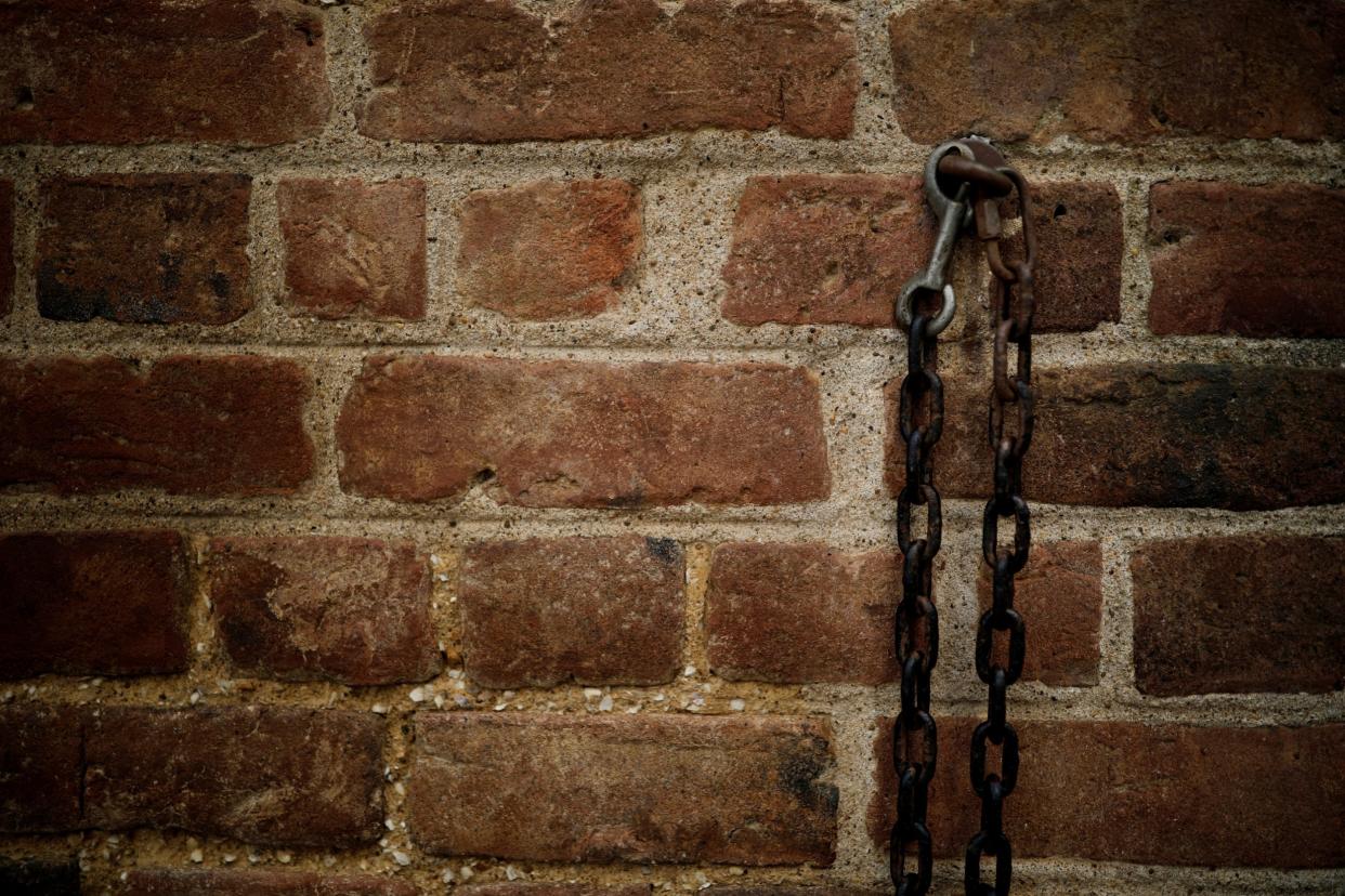 Chains and a lock attached to a wall at Mount Vernon estate, home to George Washington, first president of the United States and a slave owner: Reuters