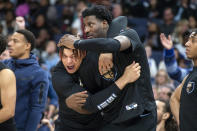 Memphis Grizzlies forwards Kenneth Lofton Jr., center left, and Jaren Jackson Jr. react in the first half of an NBA basketball game against the Philadelphia 76ers, Friday, Dec. 2, 2022, in Memphis, Tenn. (AP Photo/Brandon Dill)