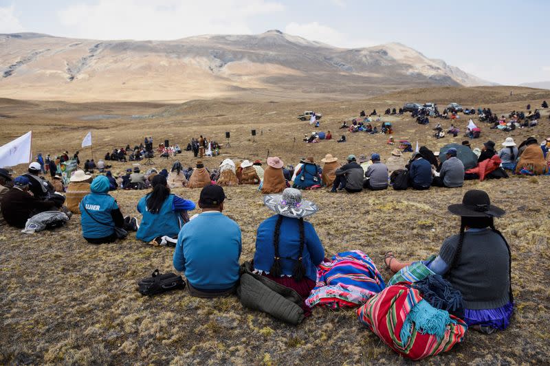 Bolivians gather at the Incachaca dam to pray for rain, on the outskirts of La Paz