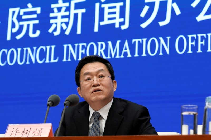 Director-general of the Health Emergency Response Office of Health Commission Xu Shuqiang speaks during a news conference in Beijing