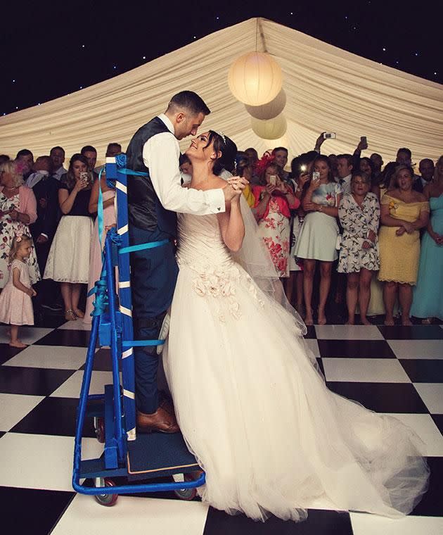 James and Michaela shared an emotional first dance using a special frame. Photo: Mega