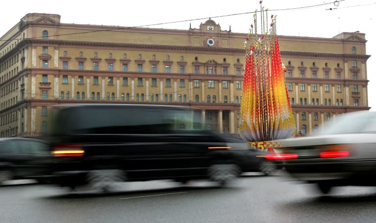 Cars pass the headquarters of the FSB security service, the successor to the KGB, in central Moscow
