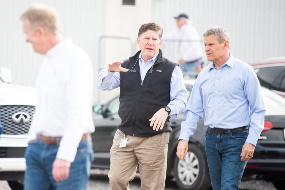 TVA CEO Jeff Lyash, left, walks on site with Tennessee Gov. Bill Lee while touring TVA's proposed Clinch River nuclear project site in Kingston on Friday, March 3, 2023. 