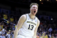 <p>Ignas Brazdeikis #13 of the Michigan Wolverines reacts after a dunk against the Florida Gators during the first half in the second round game of the 2019 NCAA Men’s Basketball Tournament at Wells Fargo Arena on March 23, 2019 in Des Moines, Iowa. (Photo by Andy Lyons/Getty Images) </p>