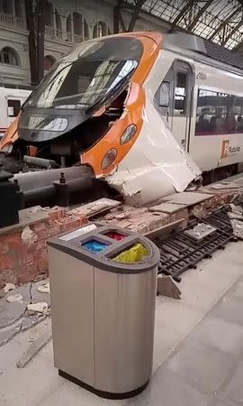 A commuter train is seen crashed into a railway buffer in Barcelona's Francia station, Spain July 28, 2017 in this still image from a video obtained from social media. Courtesy of Felix Rios /via REUTERS