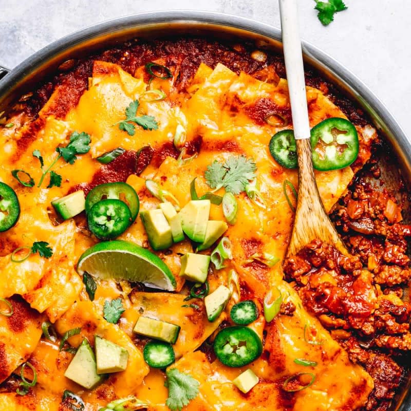 <p>Posh Journal</p><p>This Mexican-inspired dish is an easier and quicker version of traditional enchiladas made in one skillet.</p><p><strong>Get the recipe: <a href="https://poshjournal.com/skillet-beef-enchiladas" rel="nofollow noopener" target="_blank" data-ylk="slk:Skillet Beef Enchiladas;elm:context_link;itc:0;sec:content-canvas" class="link ">Skillet Beef Enchiladas</a></strong></p>