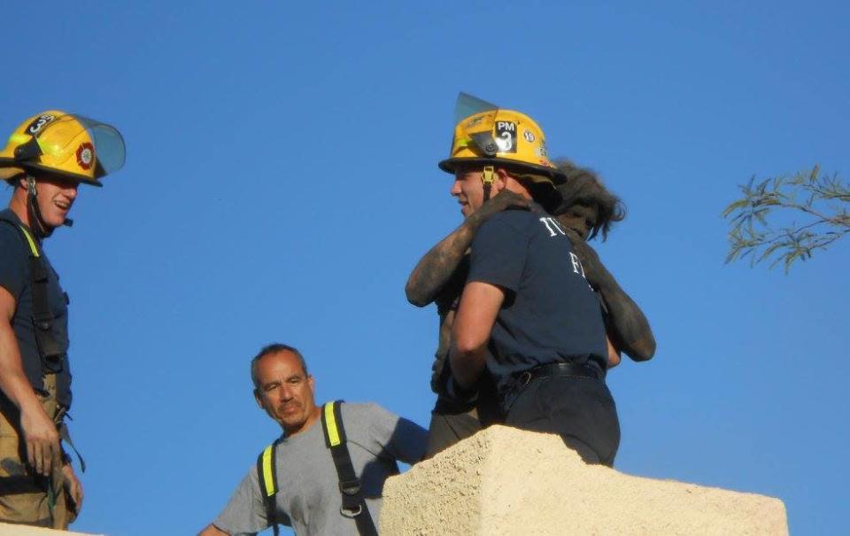 [An Arizona man who’d locked himself out of his house felt the best way to get back inside was through the chimney. Four hours later, firefighters finally got him out. Photo: Tucson Fire Department/Facebook]