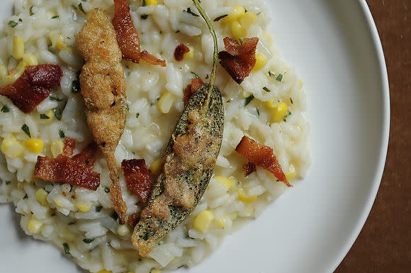Corn Risotto Garnished with Bacon and Anchovy Sage Lef Bite