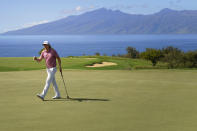 Cameron Smith waves after making birdie on the 13th green during the final round of the Tournament of Champions golf event, Sunday, Jan. 9, 2022, at Kapalua Plantation Course in Kapalua, Hawaii. (AP Photo/Matt York)