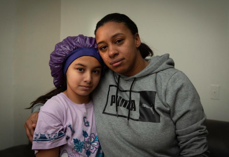 Jenny Aquino, 43, with her 11-year-old daughter, Bella Perez. The two were attacked by accused subway shover Christian Valdez in 2017 inside their South Bronx apartment. James Messerschmidt