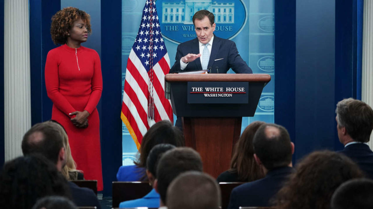 White House Press Karine Jean-Pierre watches as National Security Council Coordinator for Strategic Communications John Kirby (R) speaks during the daily press briefing in the James S Brady Press Briefing Room of the White House in Washington, DC, on February 13, 2023. (Photo by MANDEL NGAN / AFP)