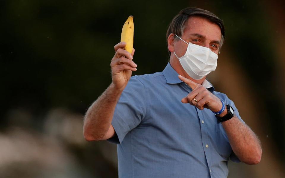 Bolsonaro holding a banana - Adriano Machado/Reuters