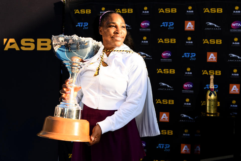 Serena Williams celebrates with the trophy after winning the Auckland Classic.