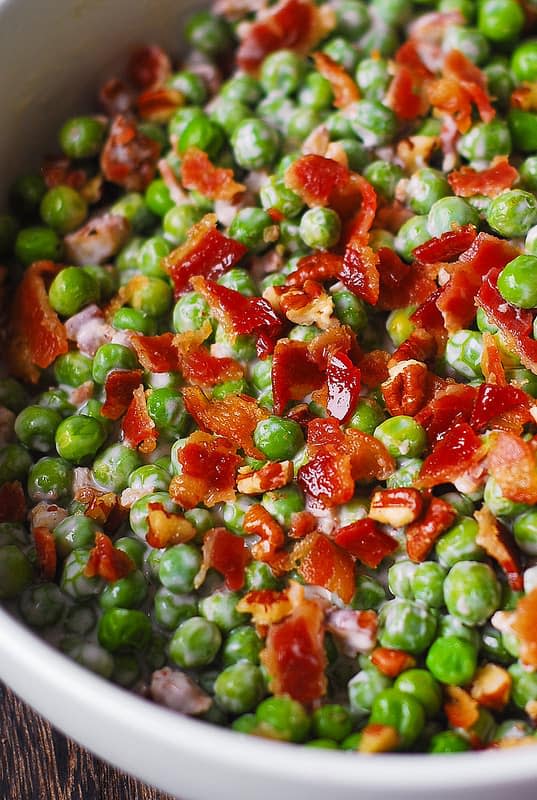 <p>Julia's Album</p><p>Creamy and crunchy salad with peas, bacon and pecans—an easy side dish that will go with many different kinds of meals!</p><p><strong>Get the recipe: <a href="https://juliasalbum.com/pea-bacon-pecan-salad/" rel="nofollow noopener" target="_blank" data-ylk="slk:Pea Bacon Salad;elm:context_link;itc:0;sec:content-canvas" class="link ">Pea Bacon Salad</a></strong></p>