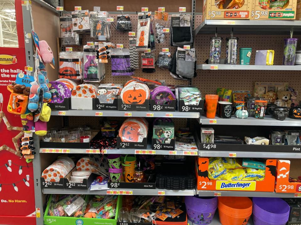 An aisle of Halloween party supplies at Walmart.
