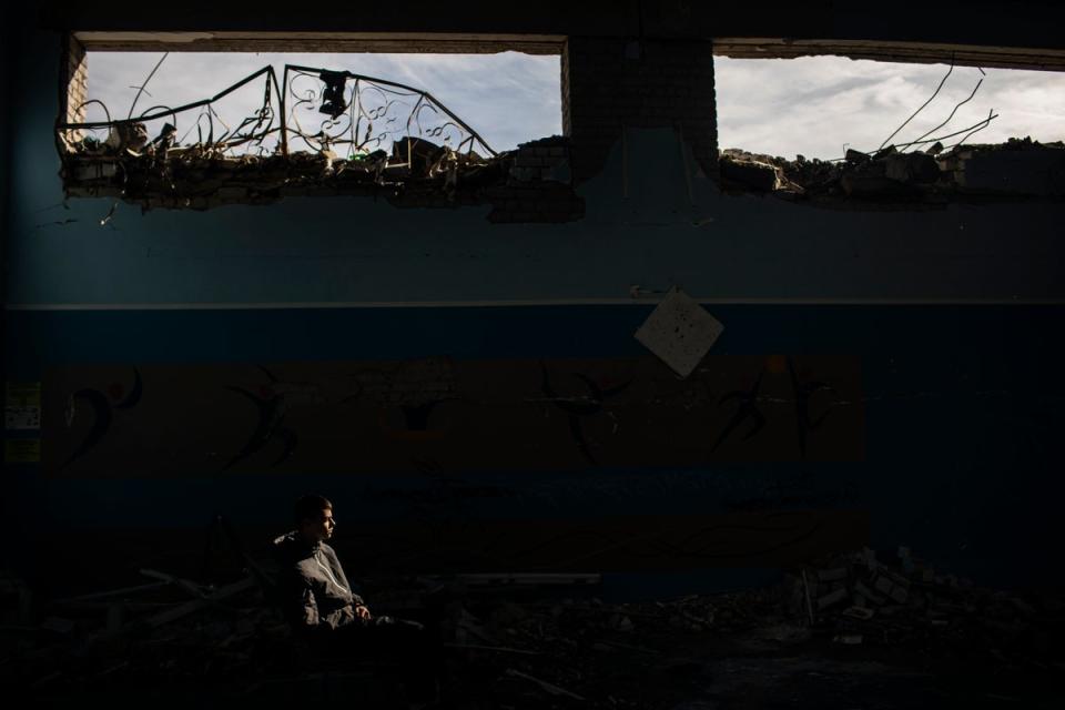 ‘It’s so sad to see my school destroyed’: Vlad, 16, inside his destroyed school in Zhytomyr (Diego Ibarra Sánchez/Unicef)