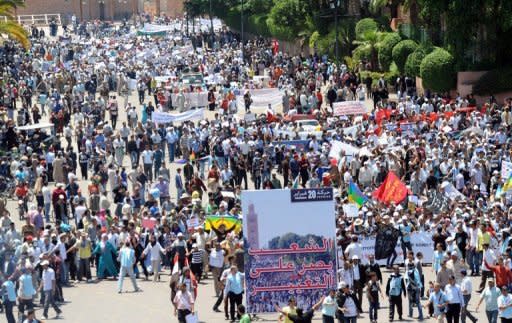 People march during a demonstration by the 20th February movement in Marrakesh on May 8, 2011 to denounce terrorism following last month's deadly bomb attack at the Argana restaurant in Djemaa El Fna square and to call for democratic reform. Several thousand demonstrators joined the march which was the second such protest in two days