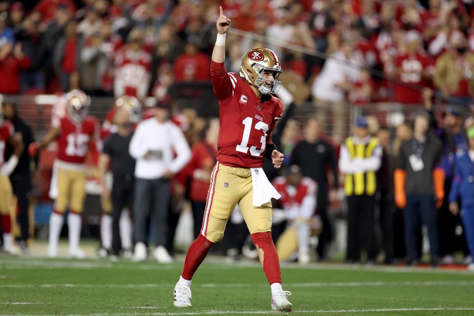 SANTA CLARA, CALIFORNIA - JANUARY 28: Brock Purdy #13 of the San Francisco 49ers reacts after the 49ers scored a touchdown against the Detroit Lions in the NFC Championship Game at Levi's Stadium on January 28, 2024 in Santa Clara, California. (Photo by Ezra Shaw/Getty Images)