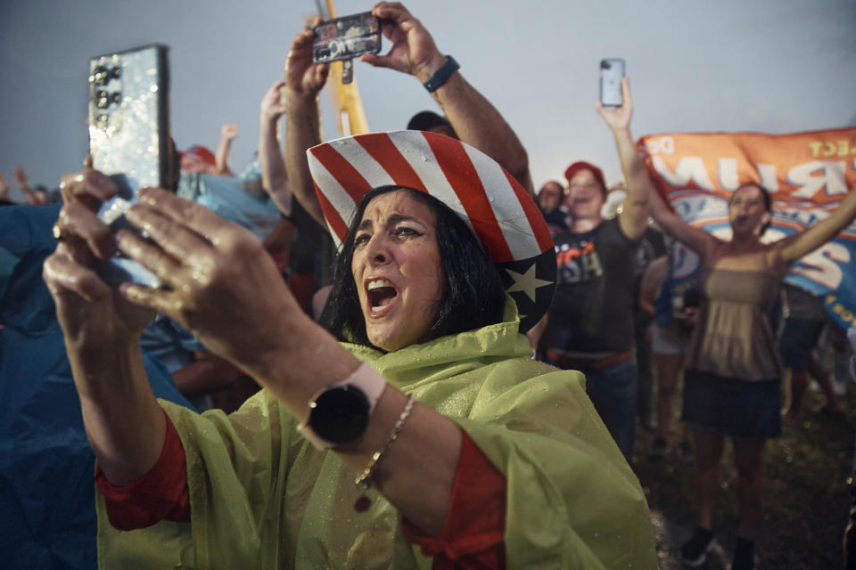 Supporters cheer as it rains on a Trump rally in Miami<span class="copyright">Andres Kudacki for TIME</span>