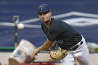 Tampa Bay Rays starting pitcher Shane McClanahan throws a bullpen session before a baseball game Thursday, Sept. 22, 2022, in St. Petersburg, Fla. McClanahan came out of his last start with neck stiffness. (AP Photo/Chris O'Meara)