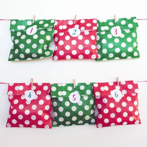 Little Cherub Design Spotty Advent Bags And Stickers from Not On The High Street - Credit: Not On The High Street