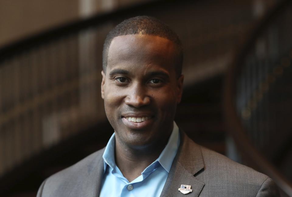 FILE - In this Monday, July 16, 2018, file photo, Republican U.S. Senate candidate John E. James is seen during a campaign stop in Sterling Heights, Mich. Michigan Republicans' uphill bid to grab hold of a U.S. Senate seat for just the second time in 40 years starts with an increasingly testy primary between two Detroit-area businessmen who are trading barbs over Donald Trump and their own business records. James or Sandy Pensler, will advance to face third-term Sen. Debbie Stabenow. (AP Photo/Carlos Osorio, File)