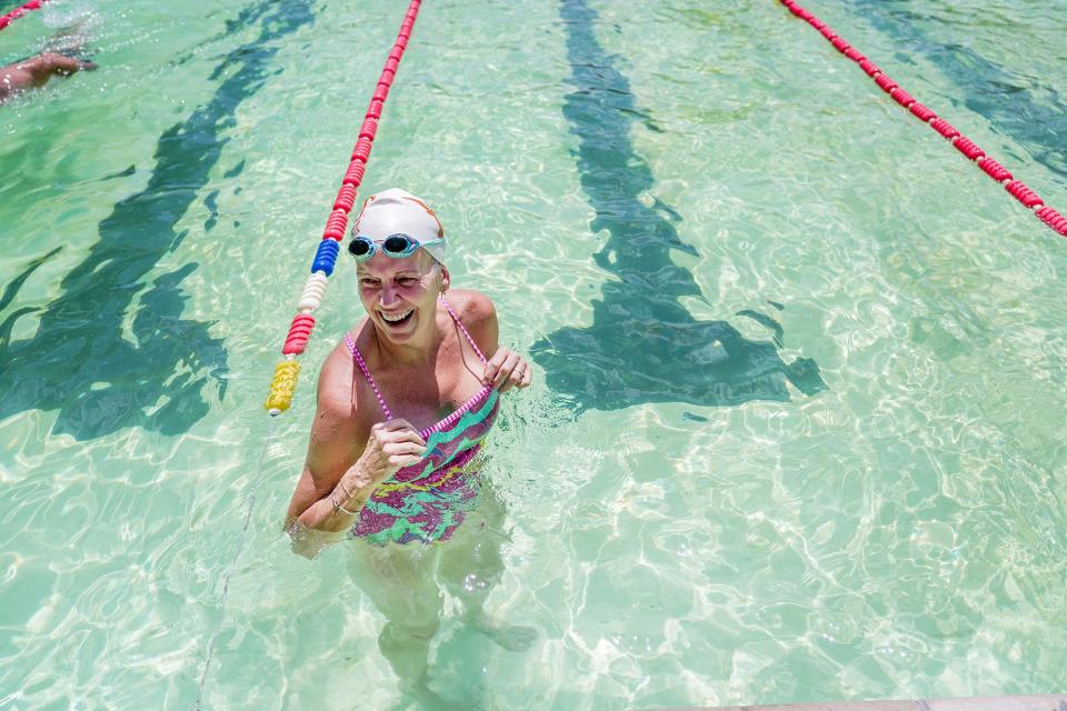 Tori Smith prepares to swim laps at Deep Eddy on Aug. 2. An Olympian in 1984, Smith had been experiencing back problems and was a great deal of pain. After surgery on her spine last year, she is now able to return to swimming.