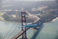 FILE PHOTO: Space shuttle Endeavour and 747 carrier aircraft soar over Golden Gate Bridge during final portion of its tour of California