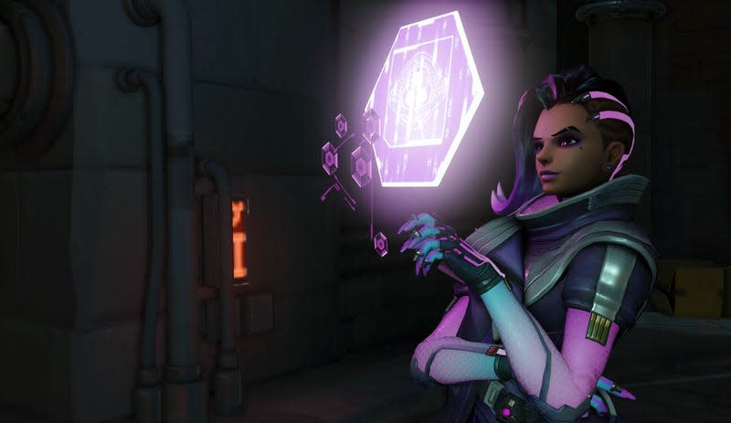 An Overwatch character looks at a glowing object.