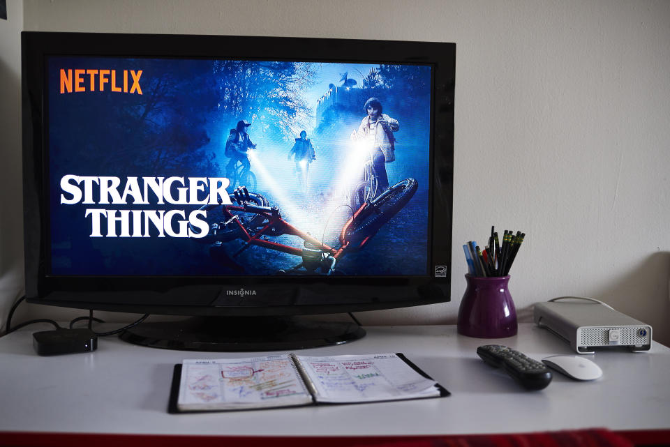 A television monitor displays the home screen for the Netflix Inc. original series "Stranger Things." Photographer: Gabby Jones/Bloomberg/Getty