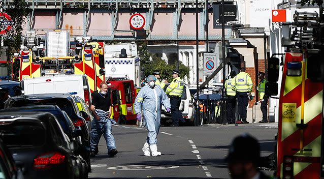 Authorities and emergency crews investigate the scene in southwest London. Source: AAP
