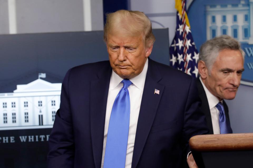 Donald Trump at a press briefing with Scott Atlas (EPA)