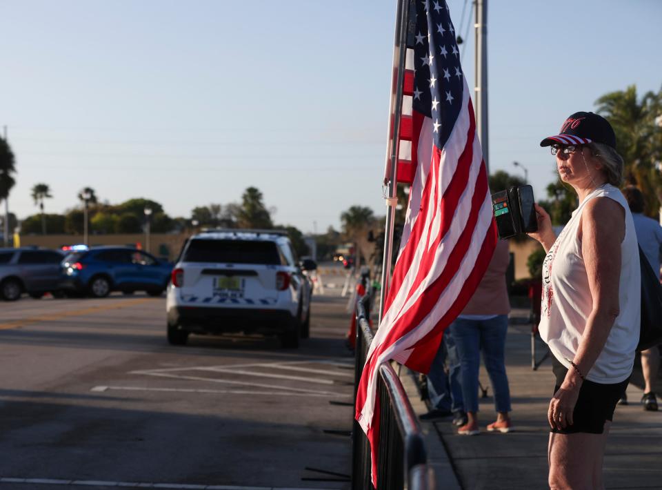 Donald Trump supporter Jeannie Fazio, of Port St. Lucie, waits outside the federal courthouse waiting for Trump to arrive for a classified documents sealed hearing in Fort Pierce on Monday, Feb, 12, 2024.