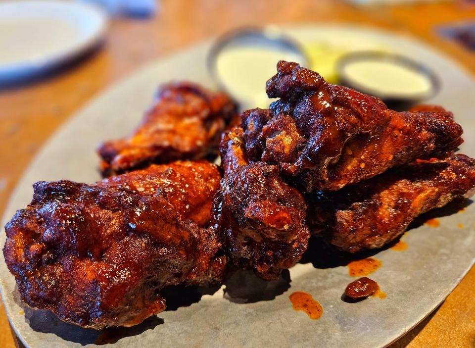 Ford's Classic Wings tossed in Nashville Hot Sauce at the Ford's Garage at University Town Center, near Sarasota and Bradenton, photographed July 11, 2023.