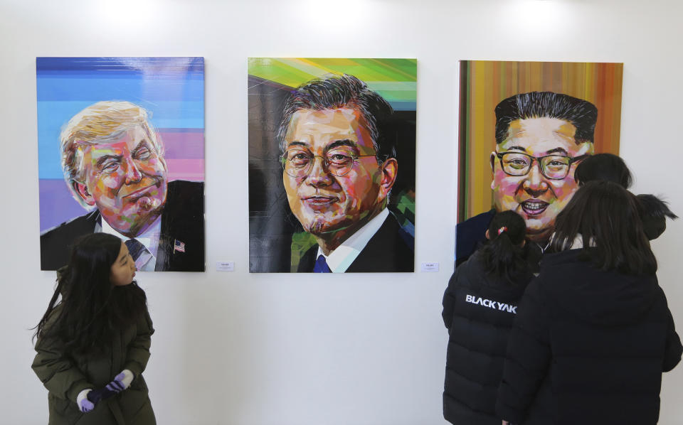 FILE - In this Jan. 3, 2019 file photo, images, from left, of U.S. President Donald Trump, South Korean President Moon Jae-in and North Korean leader Kim Jong Un are displayed during an exhibition at an annex of the presidential Blue House in Seoul, South Korea. The upcoming Trump-Kim meeting will be a crucial moment for South Korean President Moon Jae-in, who is desperate for more room to continue his engagement with North Korea, which has been limited by tough U.S.-led sanctions against Pyongyang. (AP Photo/Ahn Young-joon, File)