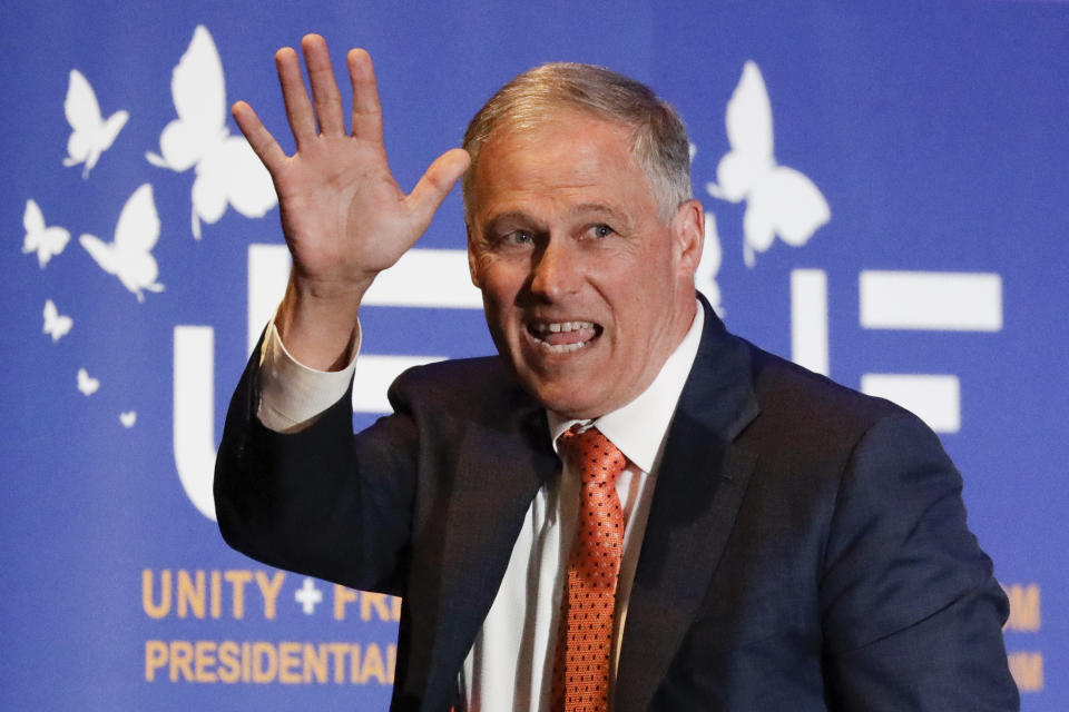 FILE - In this May 31, 2019, file photo, Democratic presidential candidate Washington Gov. Jay Inslee waves after speaking during a campaign event at the Unity Freedom Presidential Forum in Pasadena, Calif. Inslee, who made fighting climate change the central theme of his presidential campaign, announced Wednesday night, Aug. 21, that he is ending his bid for the 2020 Democratic nomination. (AP Photo/Chris Carlson, File)