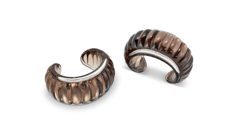 Hertz Belperron Pair of Smoky Quartz and Diamond ‘Godrons’ Cuff Bracelets. - Credit: Christie's