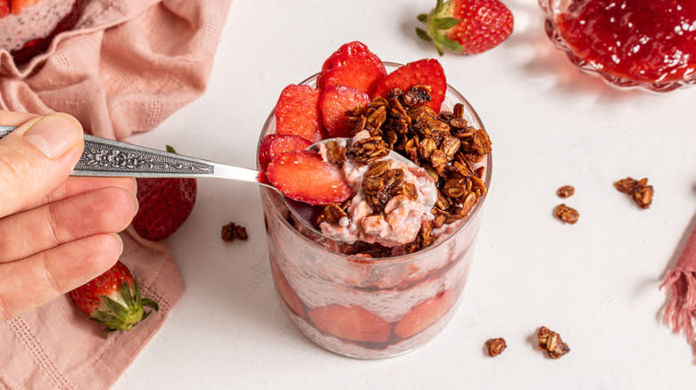 spoon in strawberry oats