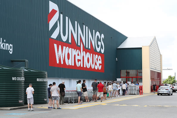 Shoppers are forced to queue outside Bunnings in Myaree due to new government social distancing measures in Perth, Australia. 