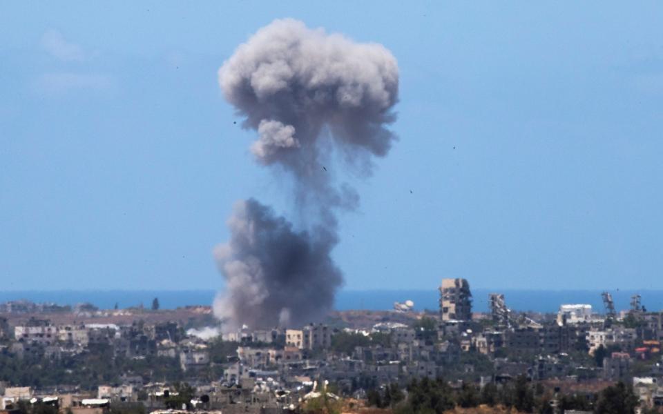 Smoke rises into the sky following Israeli bombing in the Gaza Strip on Monday