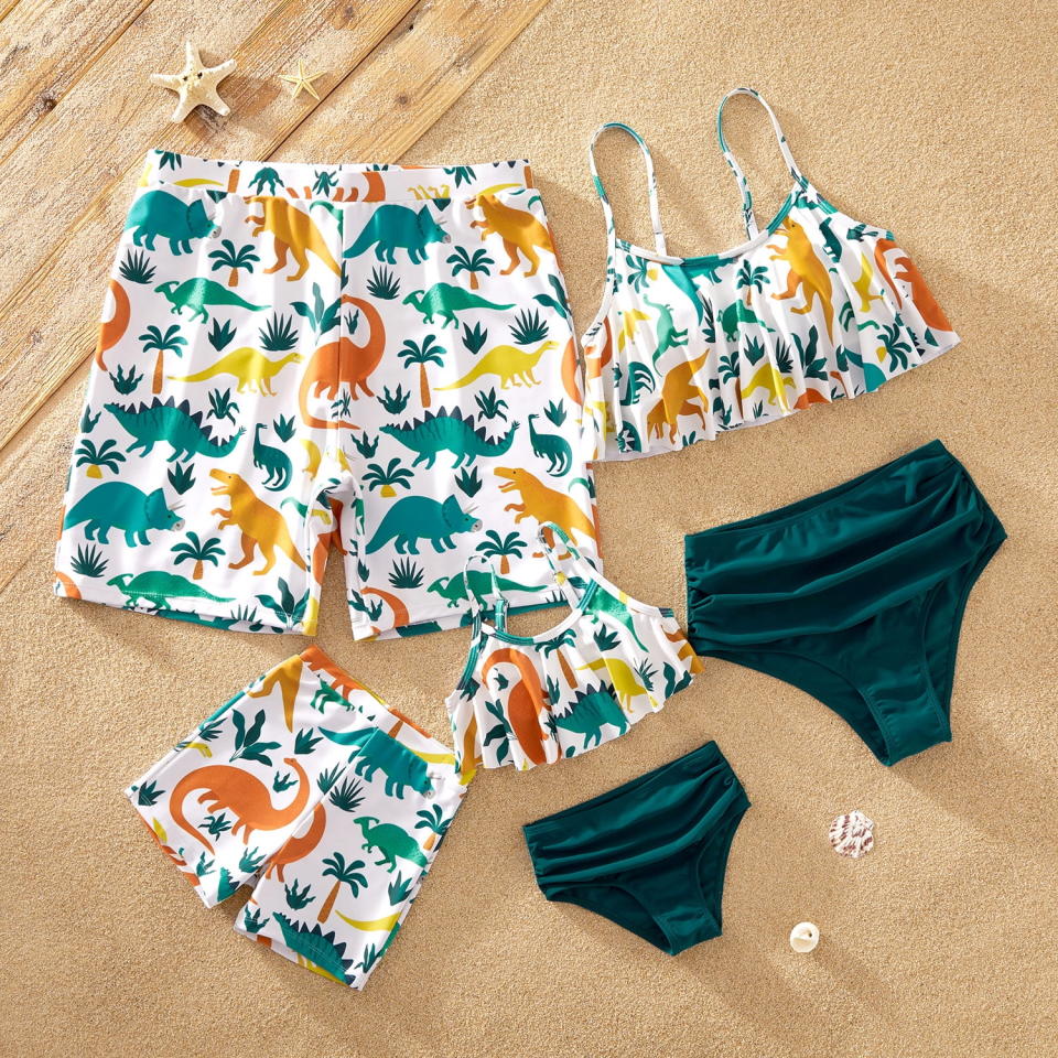 <p><a href="https://go.redirectingat.com?id=74968X1596630&url=https%3A%2F%2Fwww.walmart.com%2Fip%2FPatpat-Animal-Dinosaur-Print-Family-Matching-Swimsuits-One-Piece-Sizes-Baby-Kids-Adult%2F762725280&sref=https%3A%2F%2Fwww.thepioneerwoman.com%2Ffashion-style%2Fg60500788%2Fmatching-family-swimsuits%2F" rel="nofollow noopener" target="_blank" data-ylk="slk:Shop Now;elm:context_link;itc:0;sec:content-canvas" class="link ">Shop Now</a></p><p>Dinosaur Print Matching Swimsuits </p><p>walmart.com</p><p>$14.99</p><span class="copyright">Walmart</span>